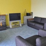Lounge end of open plan room Lounge end of open plan room